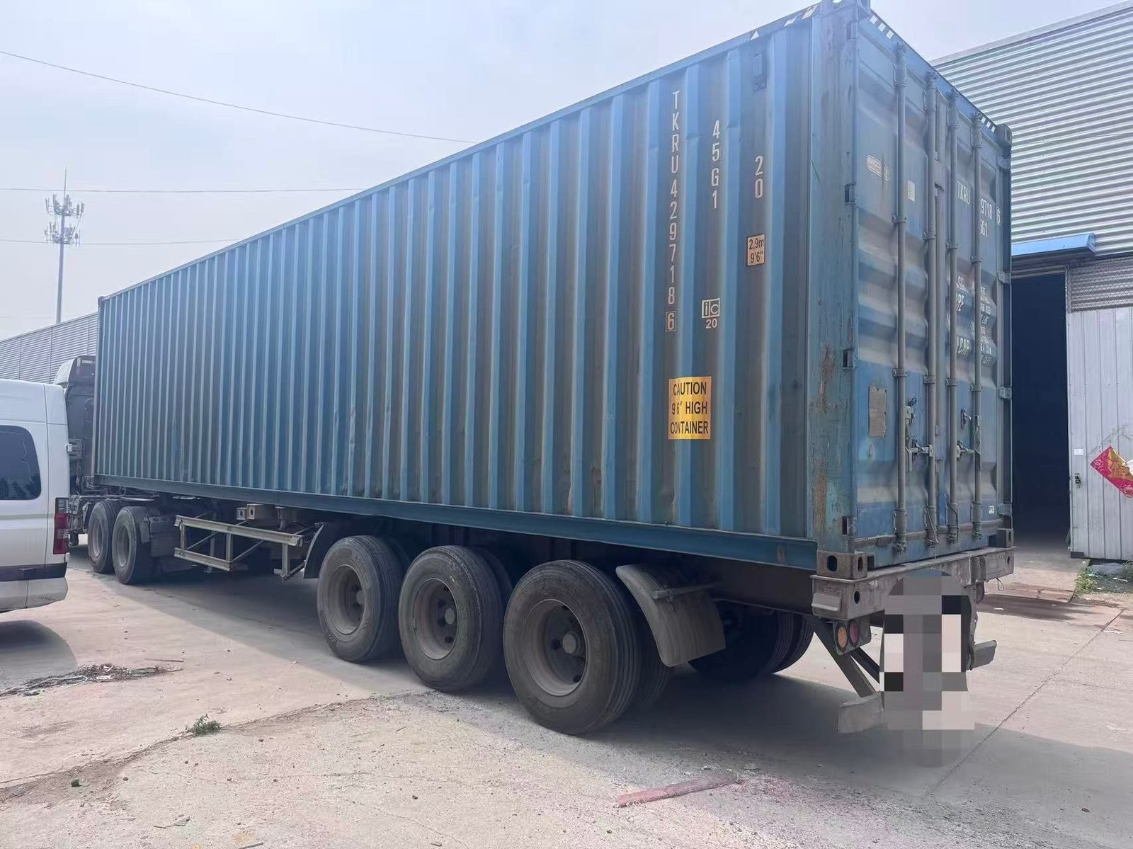 A loaded shipping container on a truck outside the Wildleg factory, ready for export.